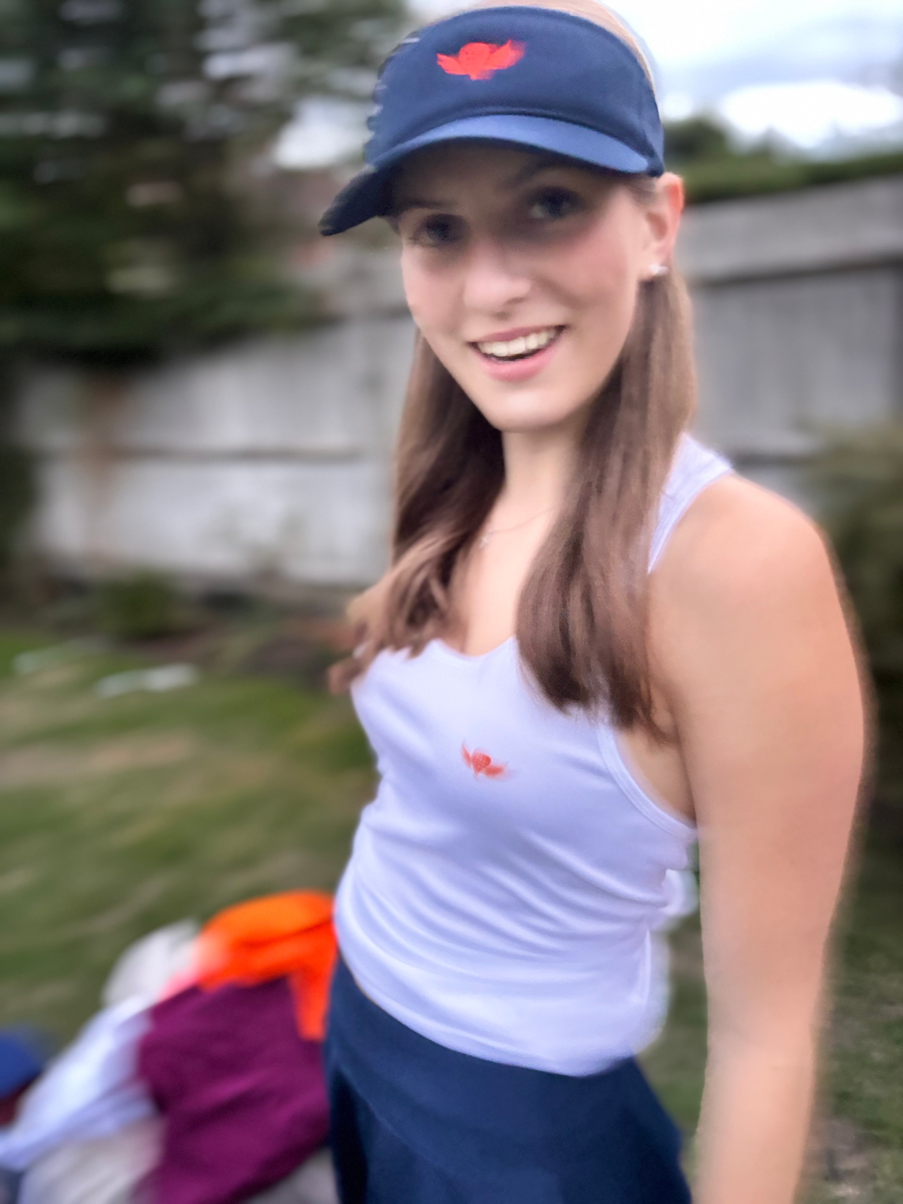 Sliding to Orange – Performance Padel and Pilates Vest