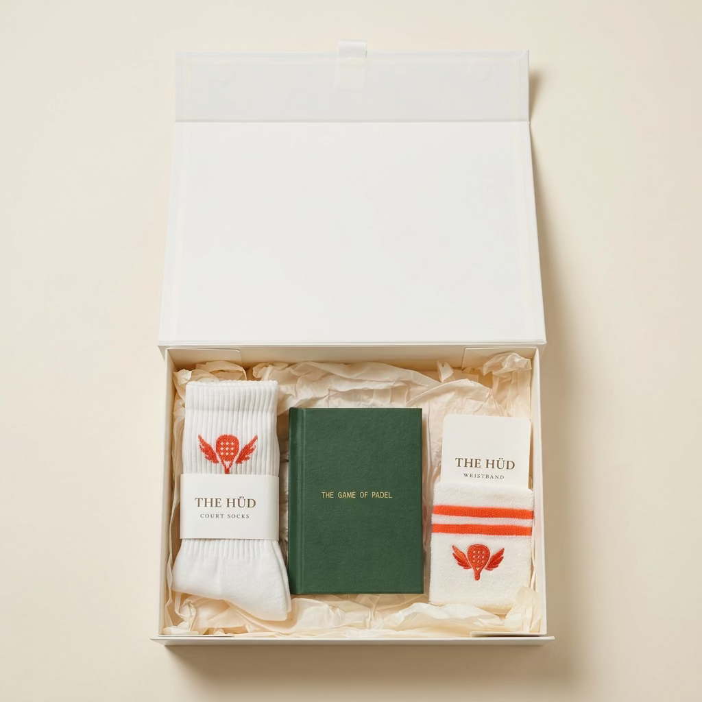 The Hud Padel Gift Box, a padel gift set with The Game of Padel book, Court Socks and wristband | The Hud