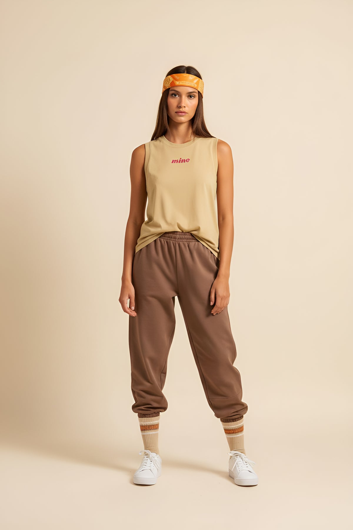 Woman wearing The Mine Padel Tank with joggers | The Hud