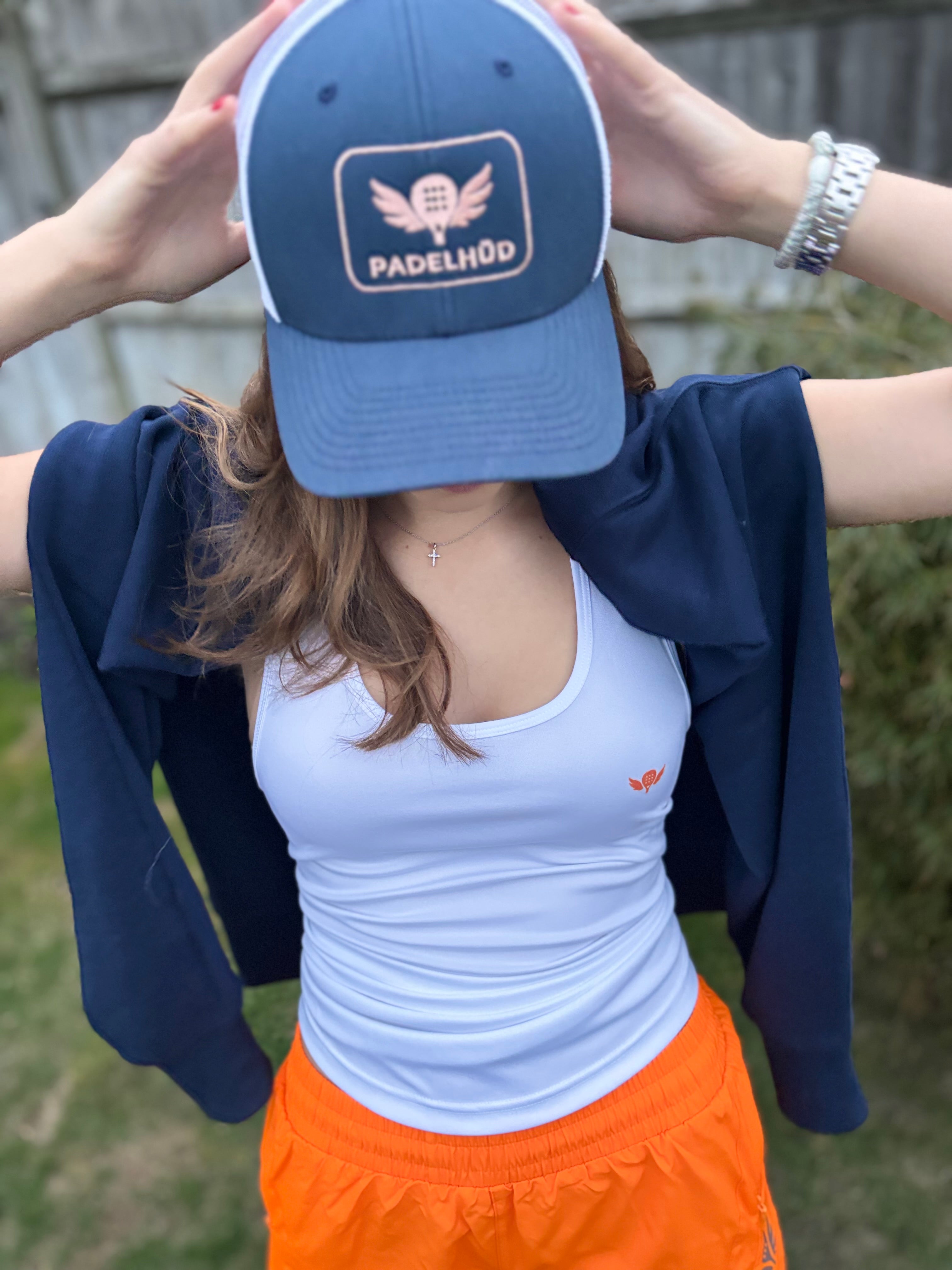 Sliding to Orange – Performance Padel and Pilates Vest